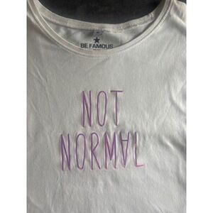 Be Famous Not Normal Graphic Tee White Iridescent Purple Lettering Size M